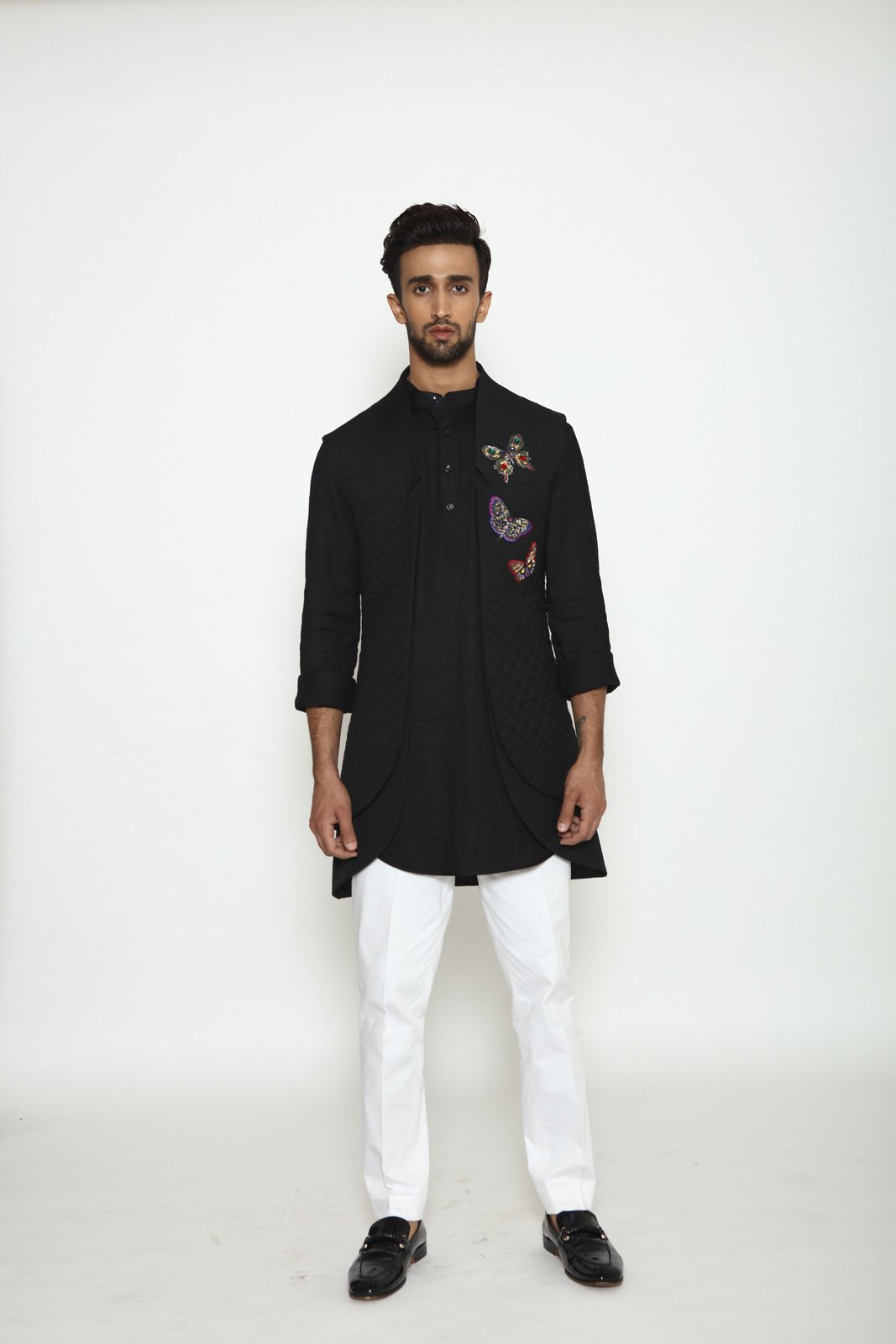 BLACK LAYERED QUILTED CAPE - Arjun Kilachand